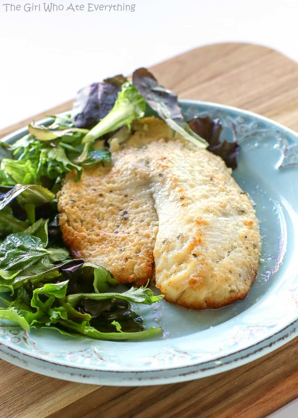 Parmesan Tilapia - a fish recipe that tastes like Doritos and it's healthy. the-girl-who-ate-everything.com
