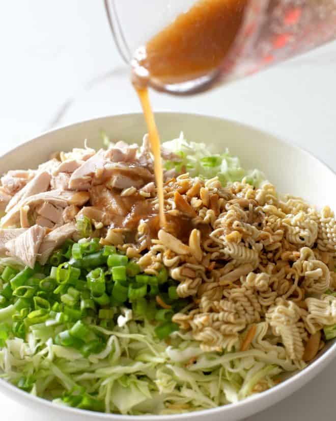 dressing poured on salad