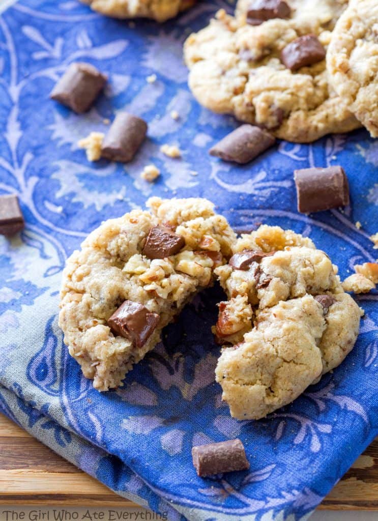 The Neiman Marcus Cookie - blended oats give the cookie a chewy texture with chocolate and nuts! Worth all the hype. the-girl-who-ate-everything.com