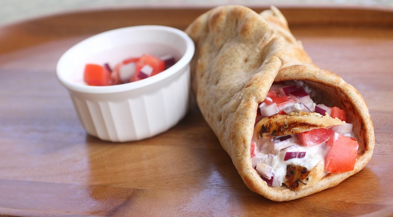 Chicken Gyros - Greek marinated chicken topped with fresh tzatziki sauce. the-girl-who-ate-everything.com