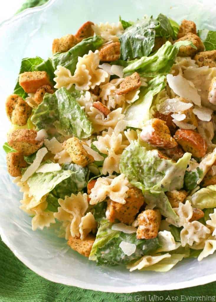 Bowtie Chicken Caesar Salad - a great way to bulk up a salad is to add cooked pasta to it! Try it and you'll never go back. the-girl-who-ate-everything.com
