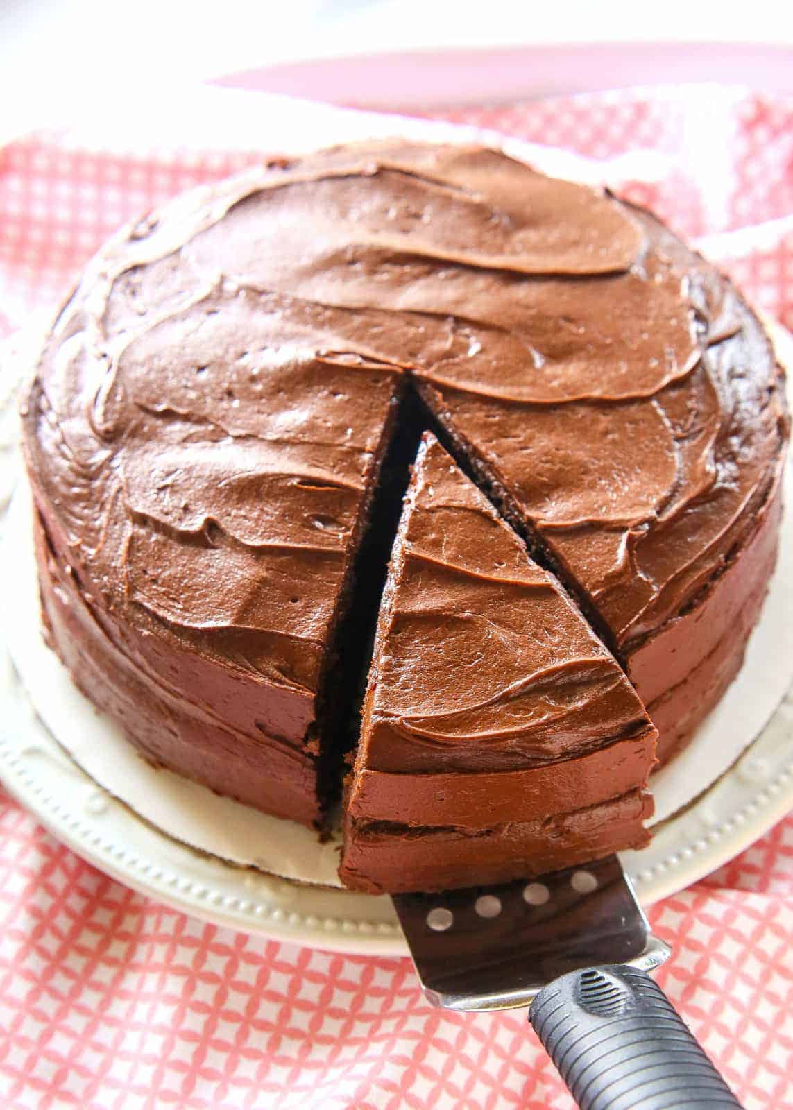 Perfect Chocolate Cake - moist with the silkiest frosting ever! the-girl-who-ate-everything.com