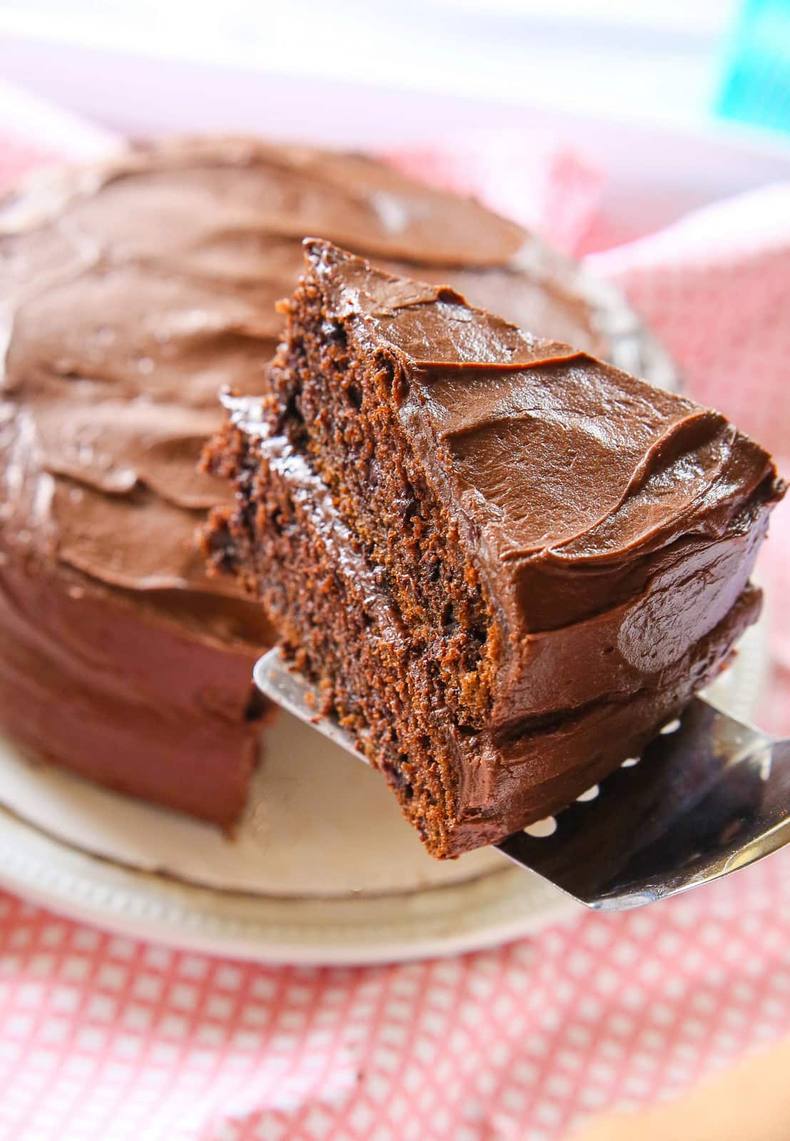 Perfect Chocolate Cake - moist with the silkiest frosting ever! the-girl-who-ate-everything.com