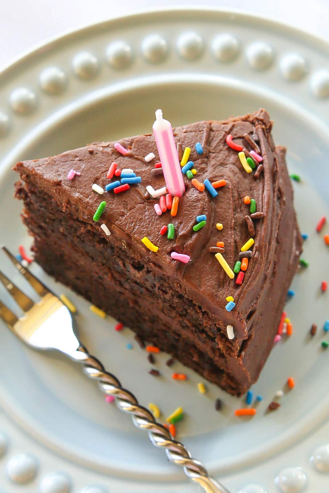 Perfect Chocolate Cake - moist with the silkiest frosting ever! the-girl-who-ate-everything.com