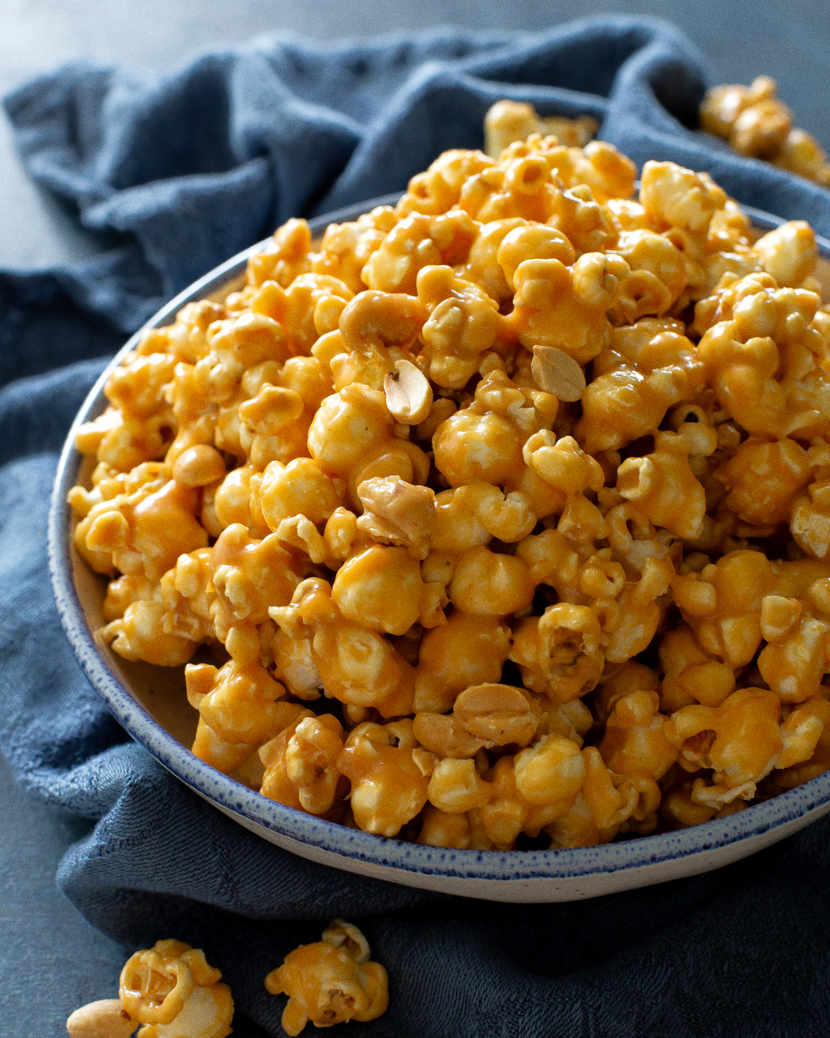 peanut butter popcorn in a blue bowl
