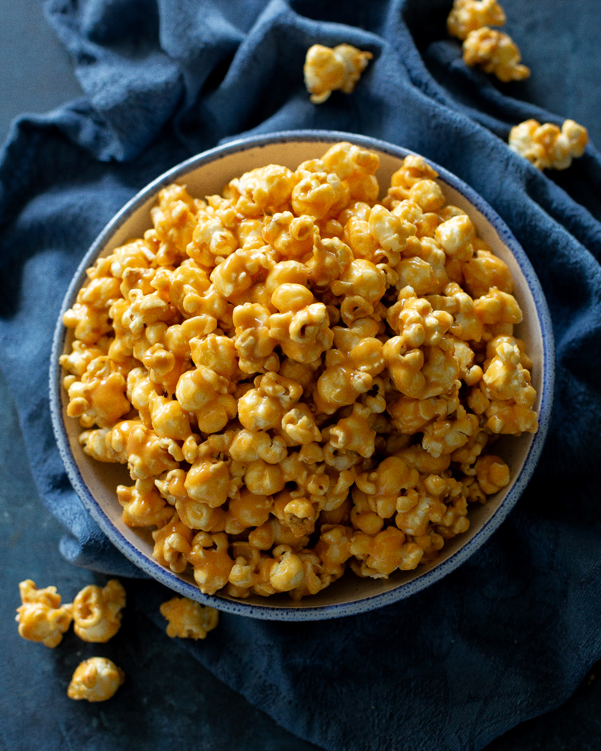 peanut butter popcorn in a blue bowl
