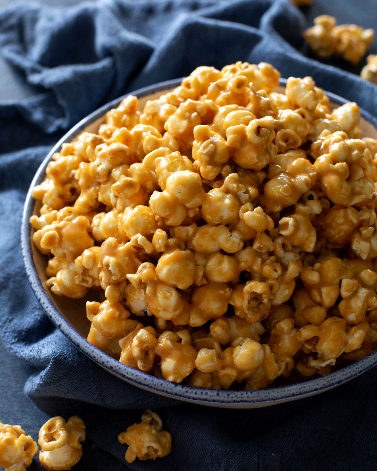 peanut butter popcorn in a blue bowl