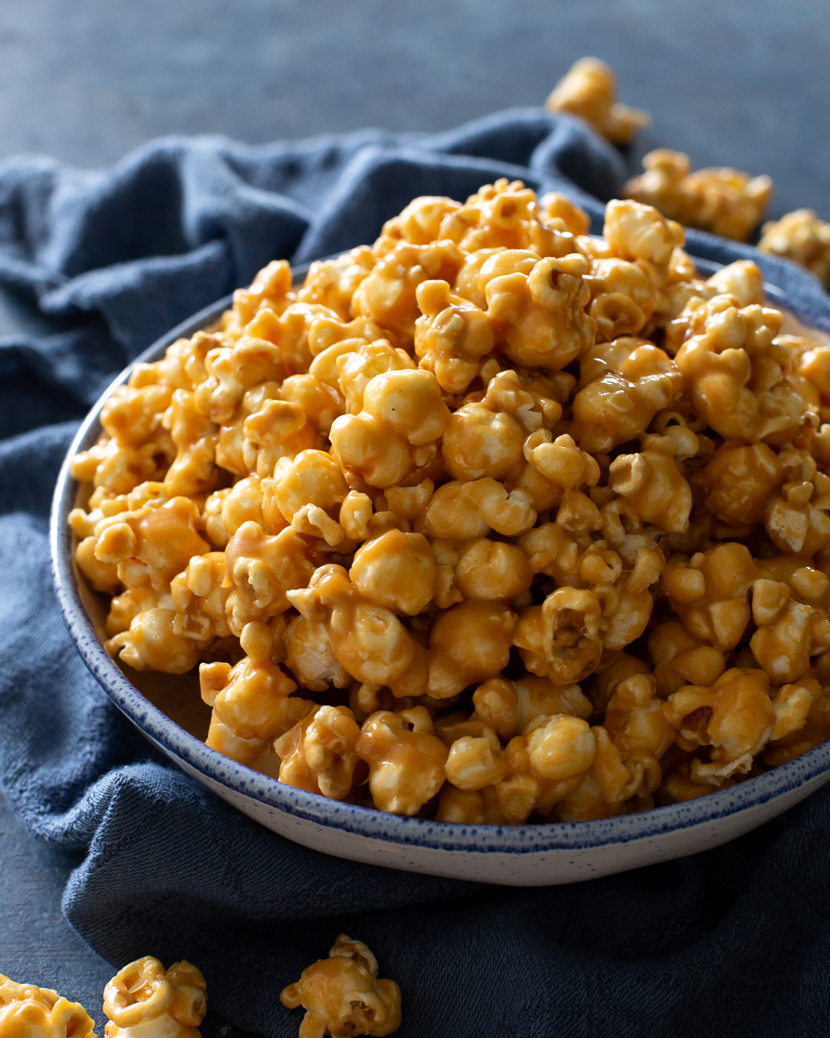 peanut butter popcorn in a blue bowl