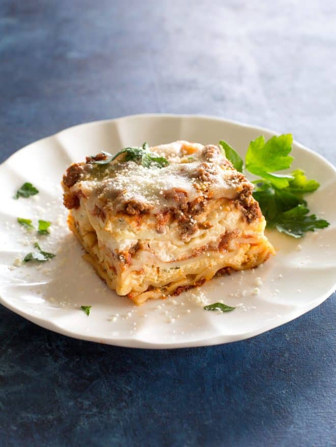 slice of lasagna on a white plate