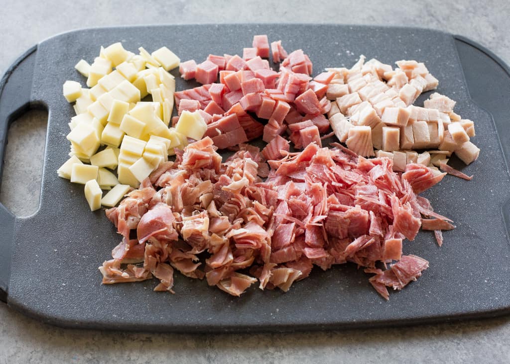 This Hoagie Dip&nbsp;recipe tastes just like a sub sandwich from Subway but in dip form. This appetizer should really be called Hoagie Spread because the best way to eat it is to spoon it on top of slices of bread.
