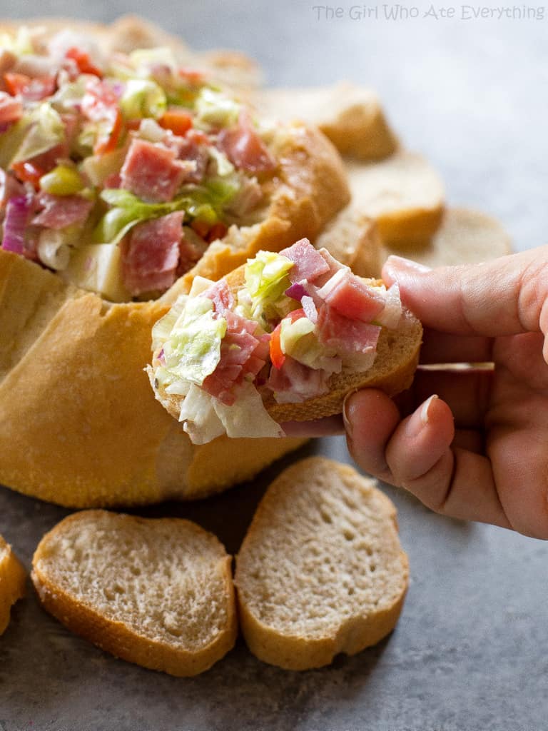 This Hoagie Dip&nbsp;recipe tastes just like a sub sandwich from Subway but in dip form. This appetizer should really be called Hoagie Spread because the best way to eat it is to spoon it on top of slices of bread.