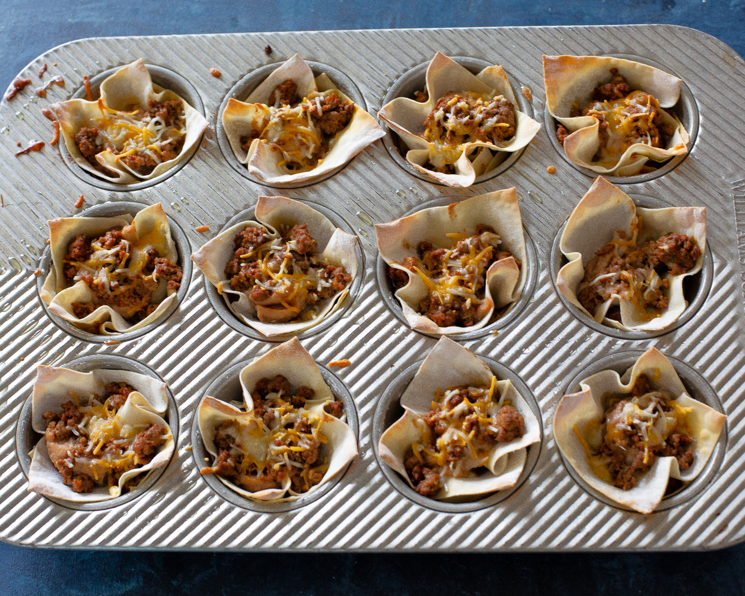wonton wrappers with beans and cheese