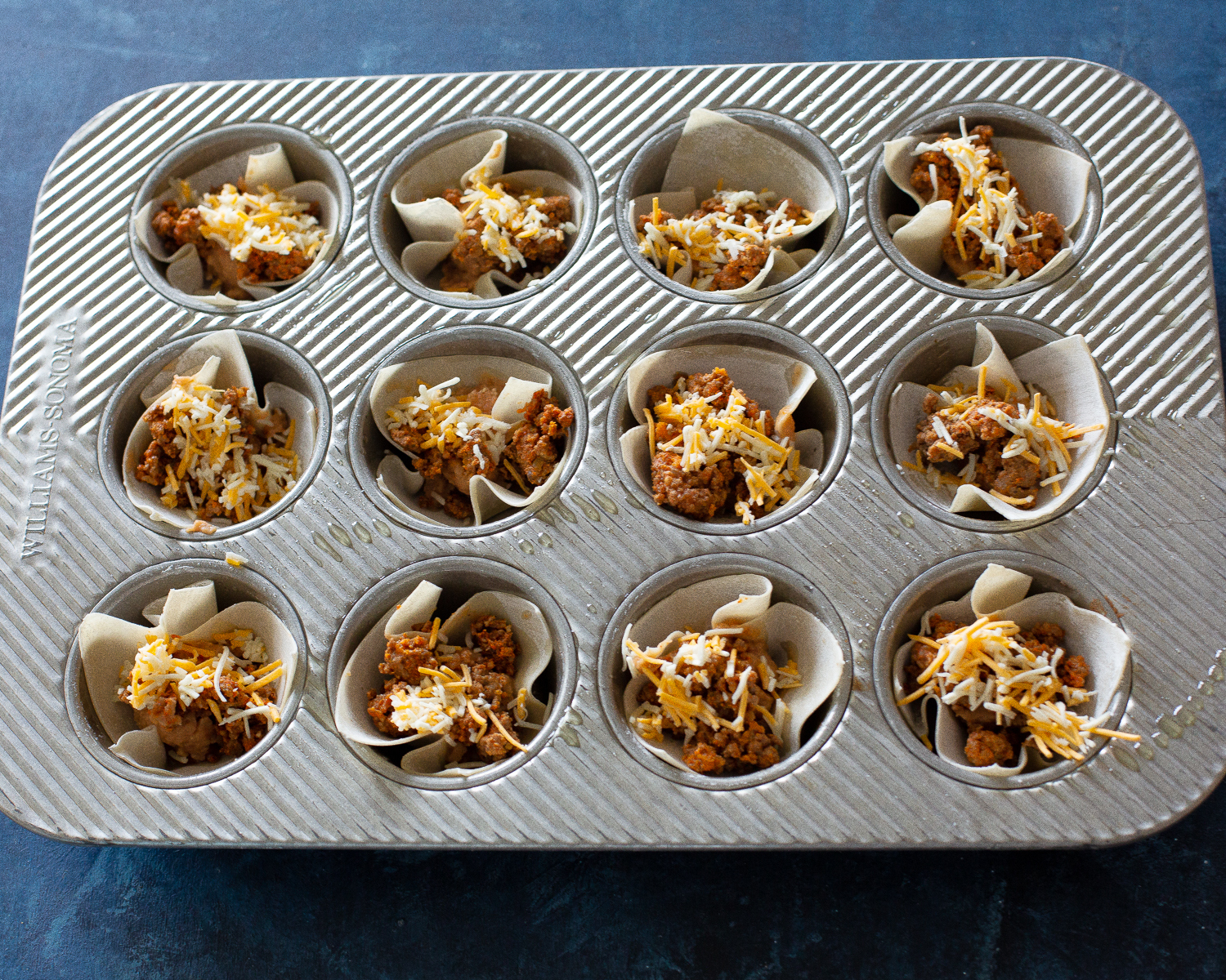 wonton wrappers with beans and cheese