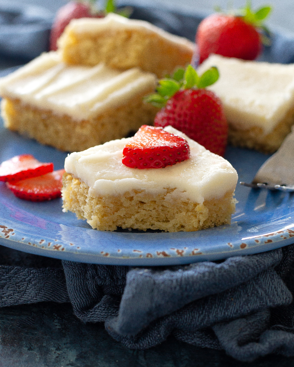White Texas Sheet Cake is a great cake for feeding a crowd. Buttery, moist, and covered in an almond flavored frosting, this cake is a tried and true recipe. #white #texas #sheet #cake #recipe