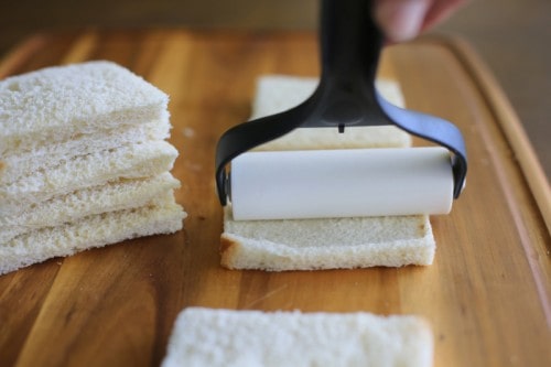 French Toast Roll-Ups - cream cheese, fruit, or whatever fillings you like rolled up in cinnamon sugar bread. the-girl-who-ate-everything.com