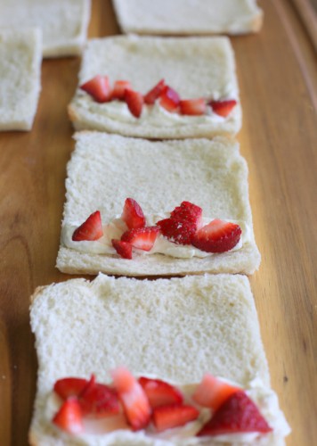 French Toast Roll-Ups - cream cheese, fruit, or whatever fillings you like rolled up in cinnamon sugar bread. the-girl-who-ate-everything.com