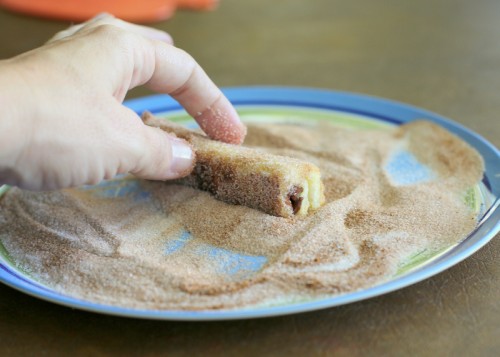 French Toast Roll-Ups - cream cheese, fruit, or whatever fillings you like rolled up in cinnamon sugar bread. the-girl-who-ate-everything.com