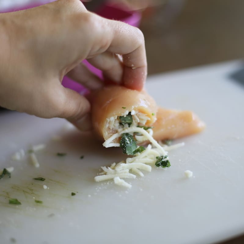 These Chicken Parmesan Roll-Ups are an easy dinner recipe that your whole family will love. the-girl-who-ate-everything.com