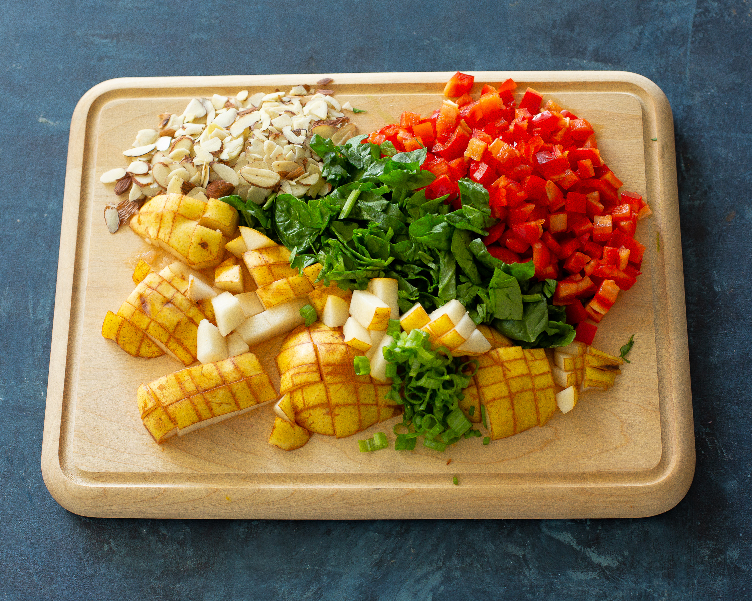 pear, almonds, bell pepper, and spinach
