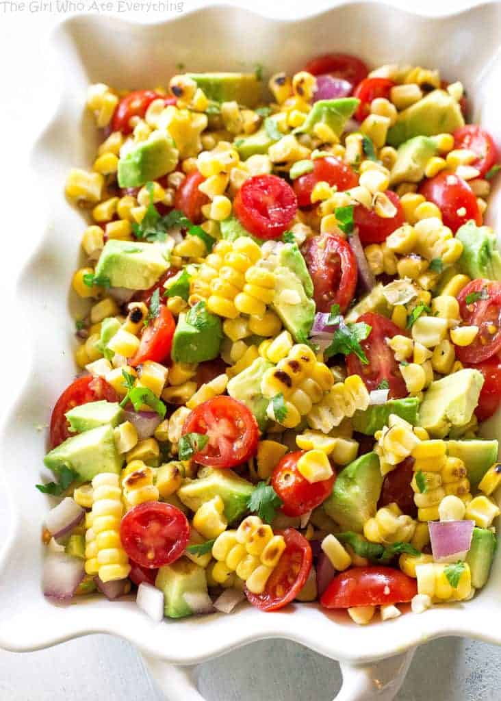 Corn, Avocado, and Tomato Salad - a healthy and light salad perfect for BBQs and get togethers. the-girl-who-ate-everything.com