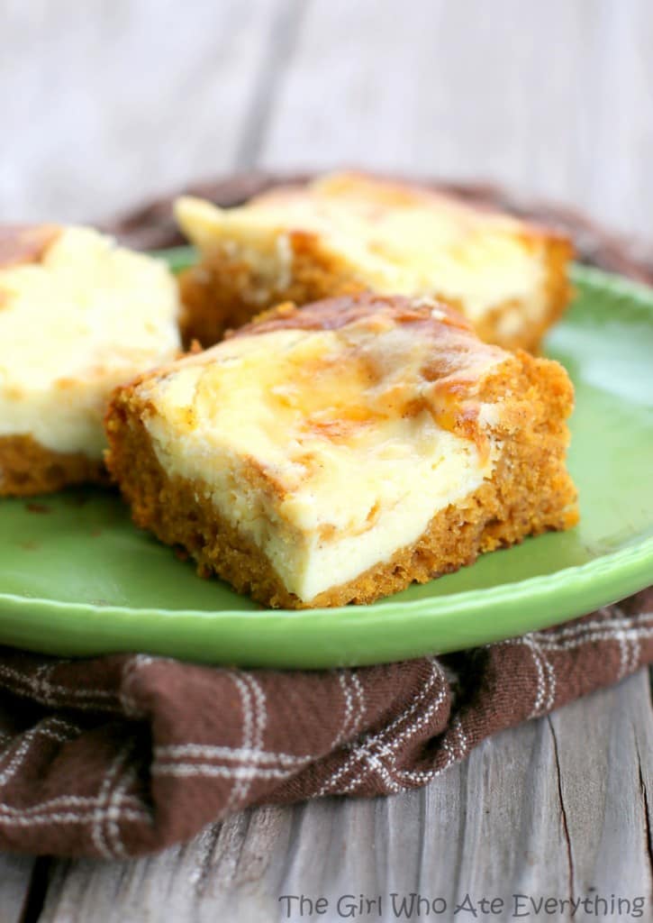 These Pumpkin Cream Cheese Bars are moist pumpkin bars with swirls of cream cheese throughout. This will be on your fall treat list every year.