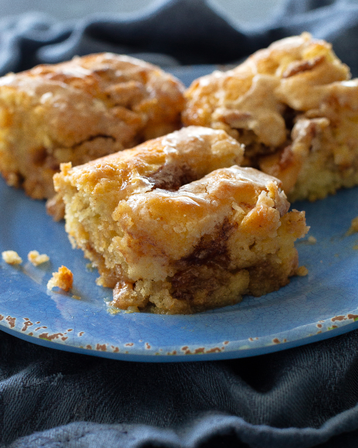 This Apple Streusel Coffee Cake recipe is full of cinnamon apple flavor and big enough to feed a crowd.  No cake mix here. This one starts from scratch! #apple #coffee #cake
