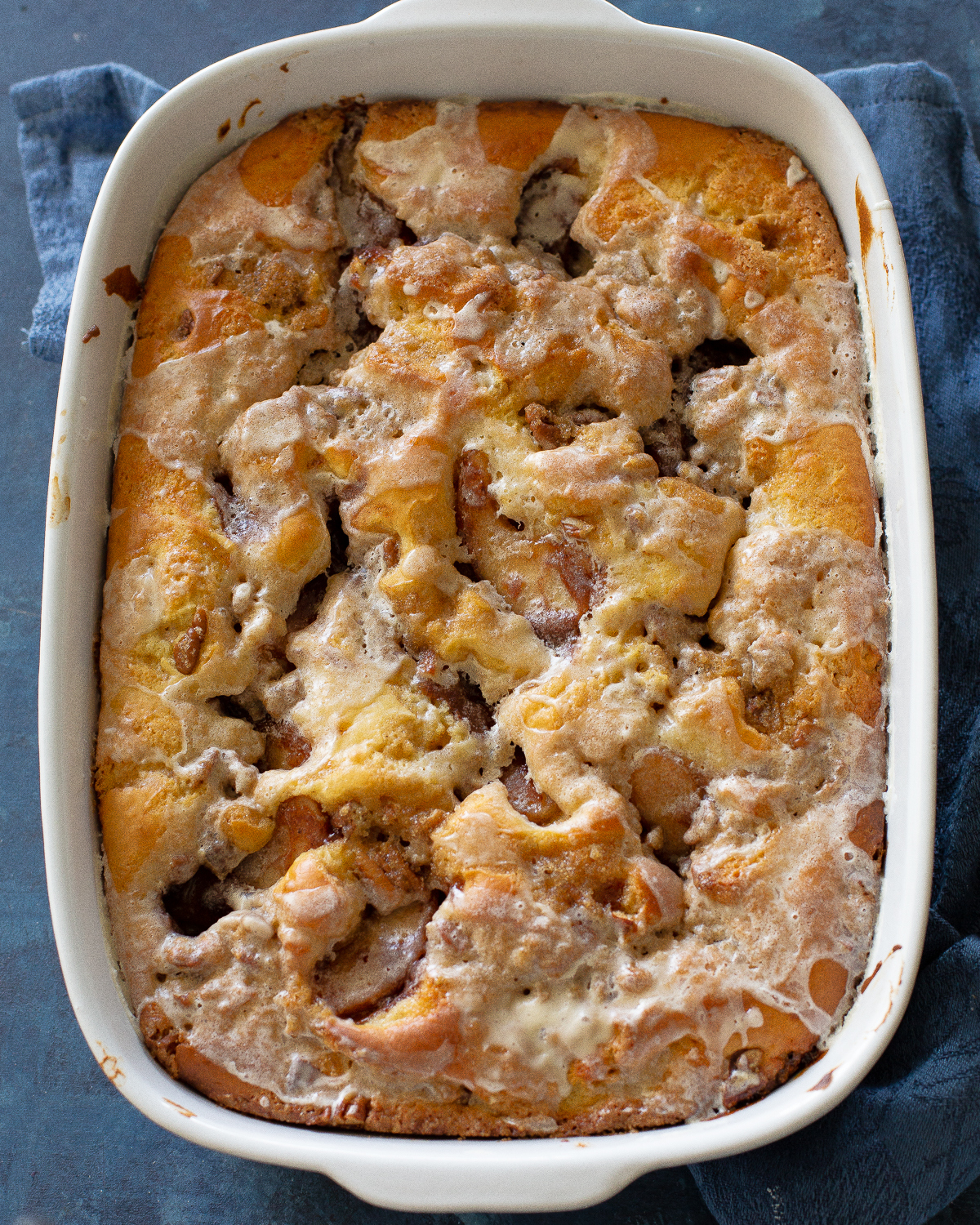 This Apple Streusel Coffee Cake recipe is full of cinnamon apple flavor and big enough to feed a crowd.  No cake mix here. This one starts from scratch! #apple #coffee #cake