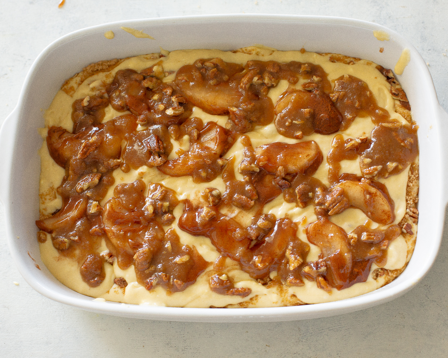 This Apple Streusel Coffee Cake recipe is full of cinnamon apple flavor and big enough to feed a crowd.  No cake mix here. This one starts from scratch! #apple #coffee #cake
