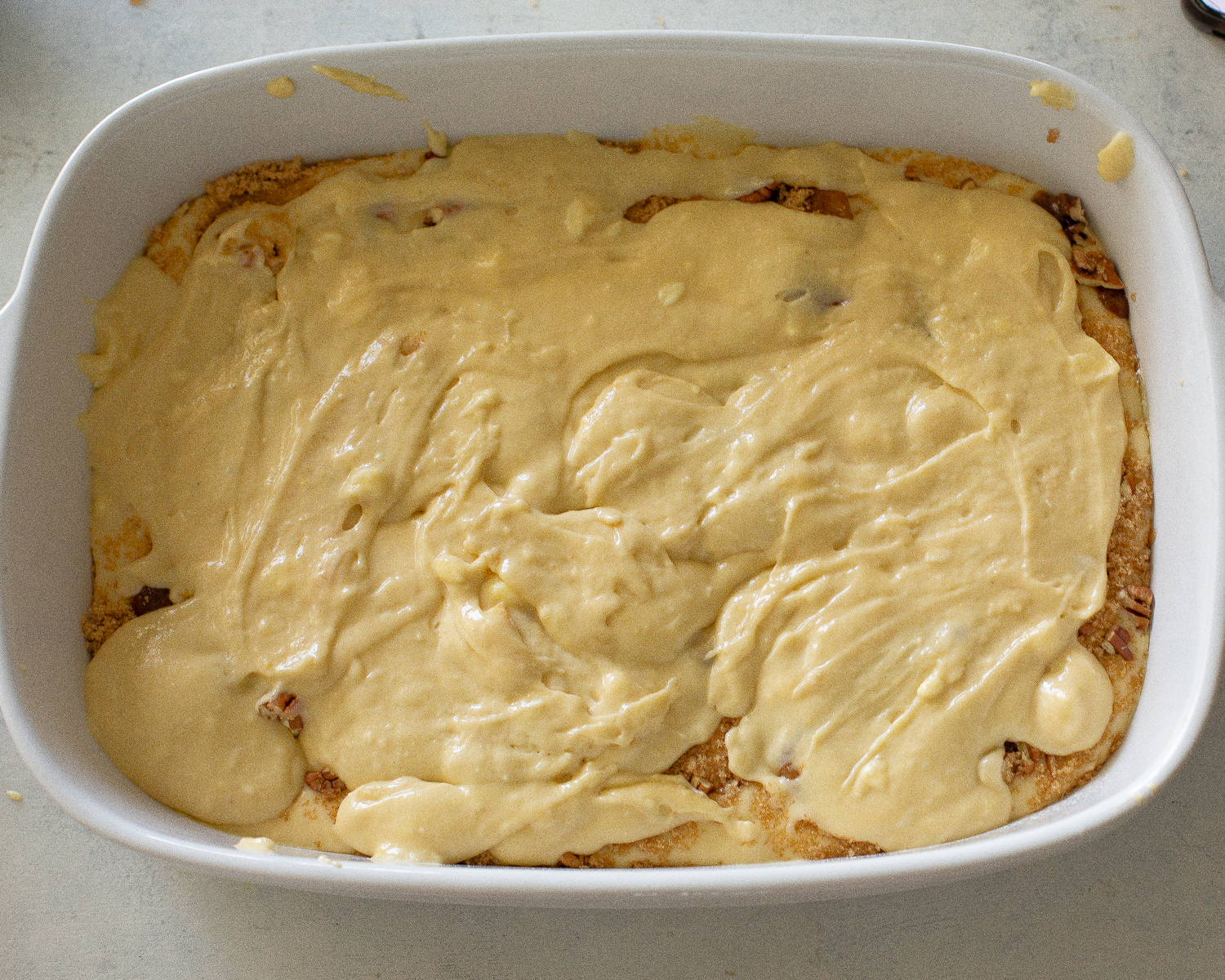 This Apple Streusel Coffee Cake recipe is full of cinnamon apple flavor and big enough to feed a crowd.  No cake mix here. This one starts from scratch! #apple #coffee #cake