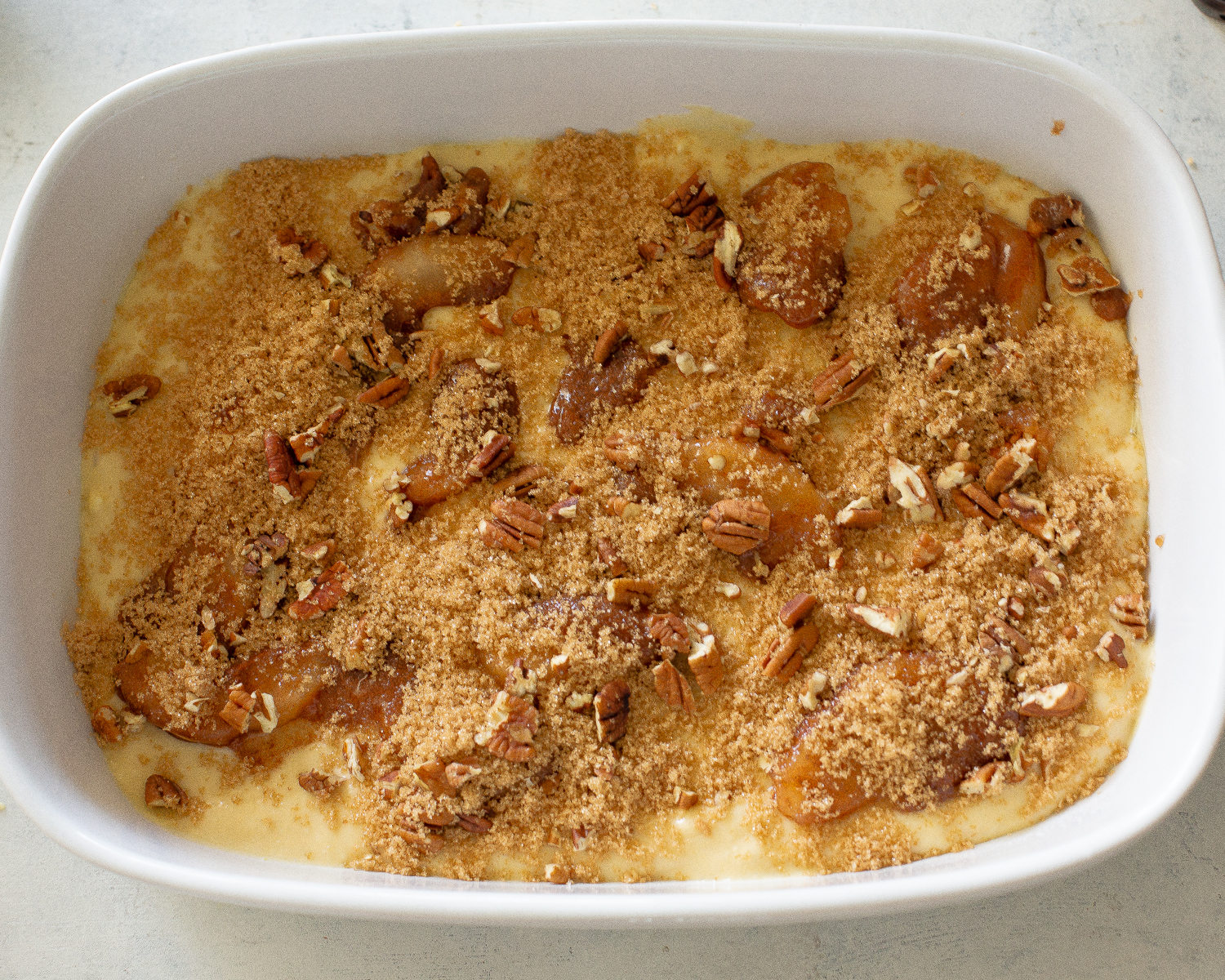 This Apple Streusel Coffee Cake recipe is full of cinnamon apple flavor and big enough to feed a crowd.  No cake mix here. This one starts from scratch! #apple #coffee #cake