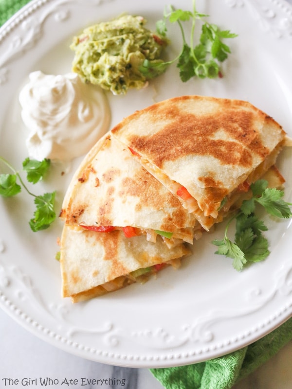 Fajita Quesadillas - Tortillas are filled with seasoned veggies and lots of cheese. A quick dinner for any night of the week. {The Girl Who Ate Everything}