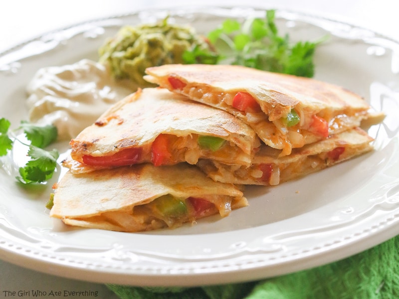 Fajita Quesadillas - Tortillas are filled with seasoned veggies and lots of cheese. A quick dinner for any night of the week. {The Girl Who Ate Everything}