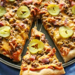 Bacon Cheeseburger Pizza - your favorite cheeseburger toppings piled on top of a pizza crust. {The GIrl Who Ate Everything}
