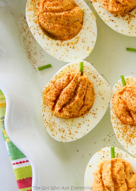 Roasted Red Pepper Deviled Eggs - naturally orange colored pumpkin shaped deviled eggs. the-girl-who-ate-everything.com deviled eggs