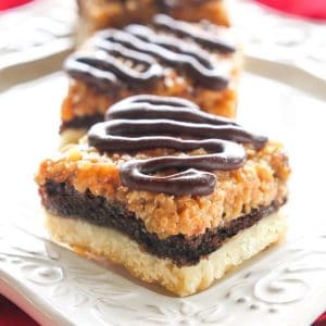 Samoa Brownie Bars - A shortbread crust topped with a brownie layer and caramel coconut inspired by the girl scout cookie. the-girl-who-ate-everything.com