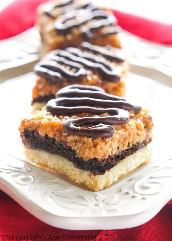 Samoa Brownie Bars - A shortbread crust topped with a brownie layer and caramel coconut inspired by the girl scout cookie. the-girl-who-ate-everything.com