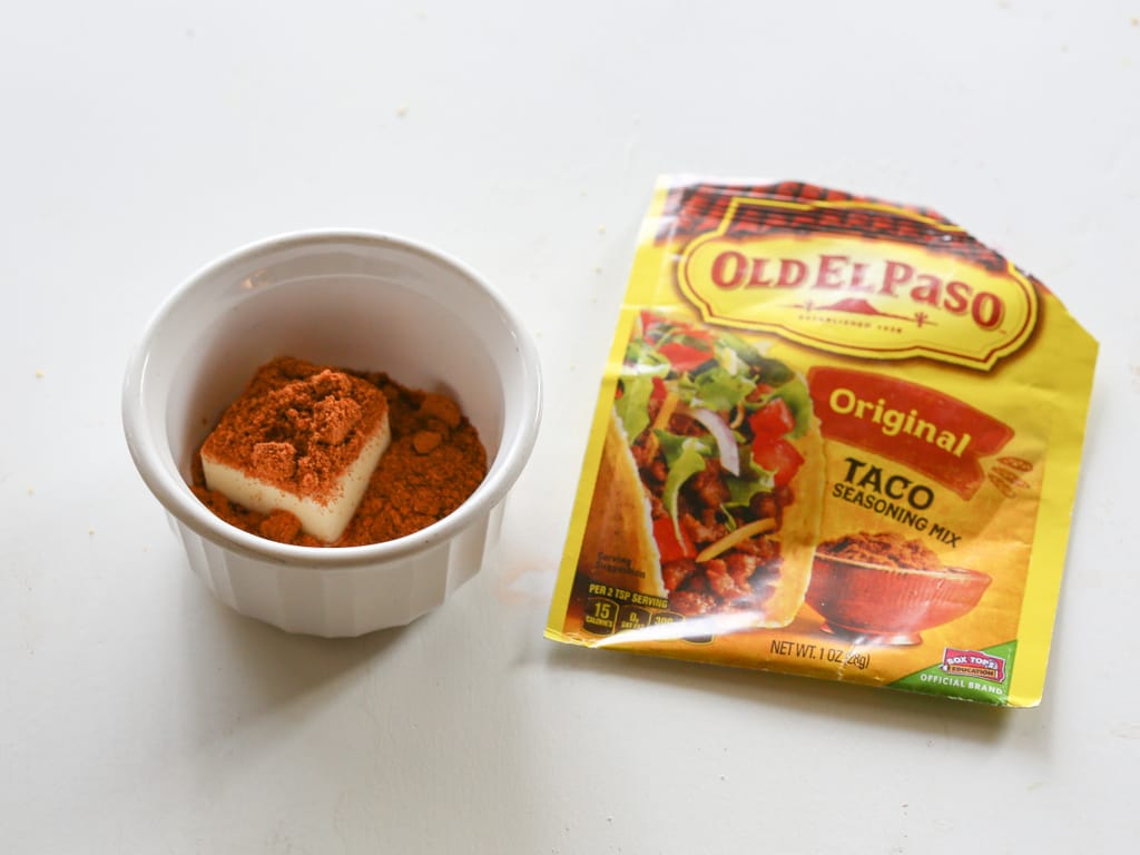 Taco Party Bread - A fun appetizer made with sourdough bread stuffed with taco meat, cheese, and topped with your favorite taco fixings. the-girl-who-ate-everything.com
