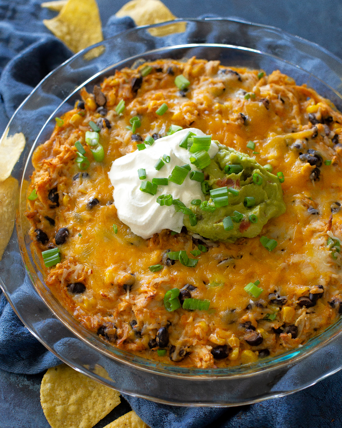 This Chicken Burrito Dip appetizer has all of the flavors of your favorite burrito but in dip form. The leftovers are great as a burrito filling! #burrito #dip #recipe