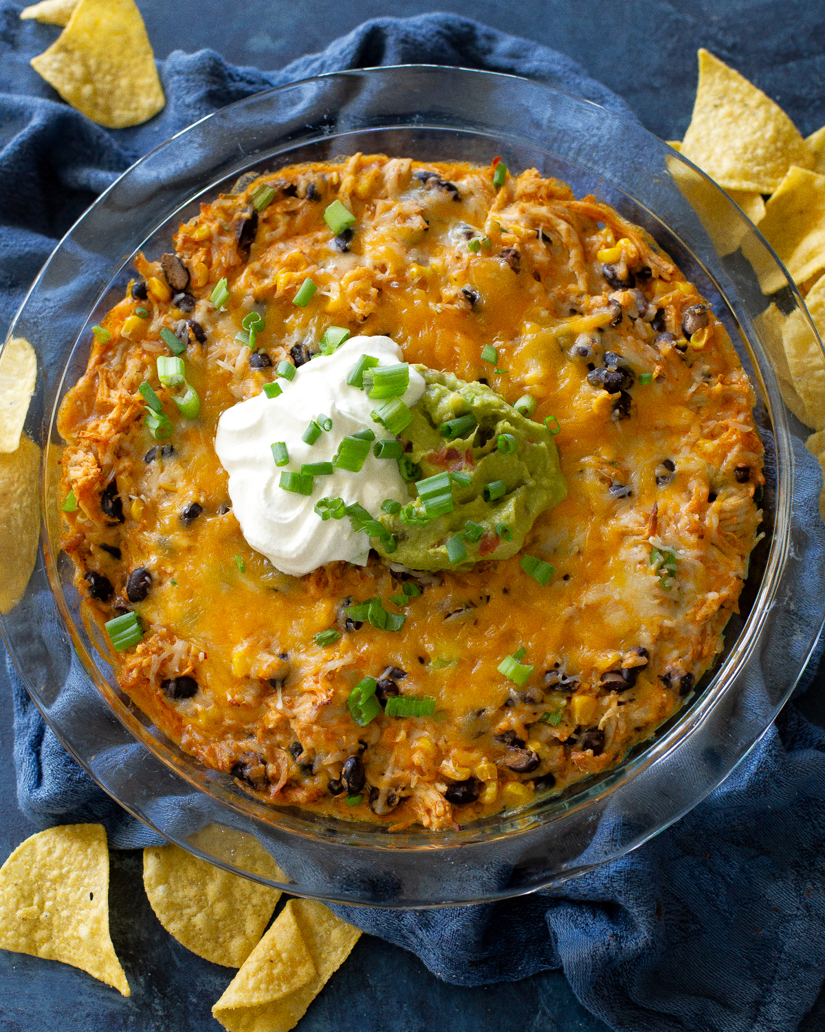 This Chicken Burrito Dip appetizer has all of the flavors of your favorite burrito but in dip form. The leftovers are great as a burrito filling! #burrito #dip #recipe
