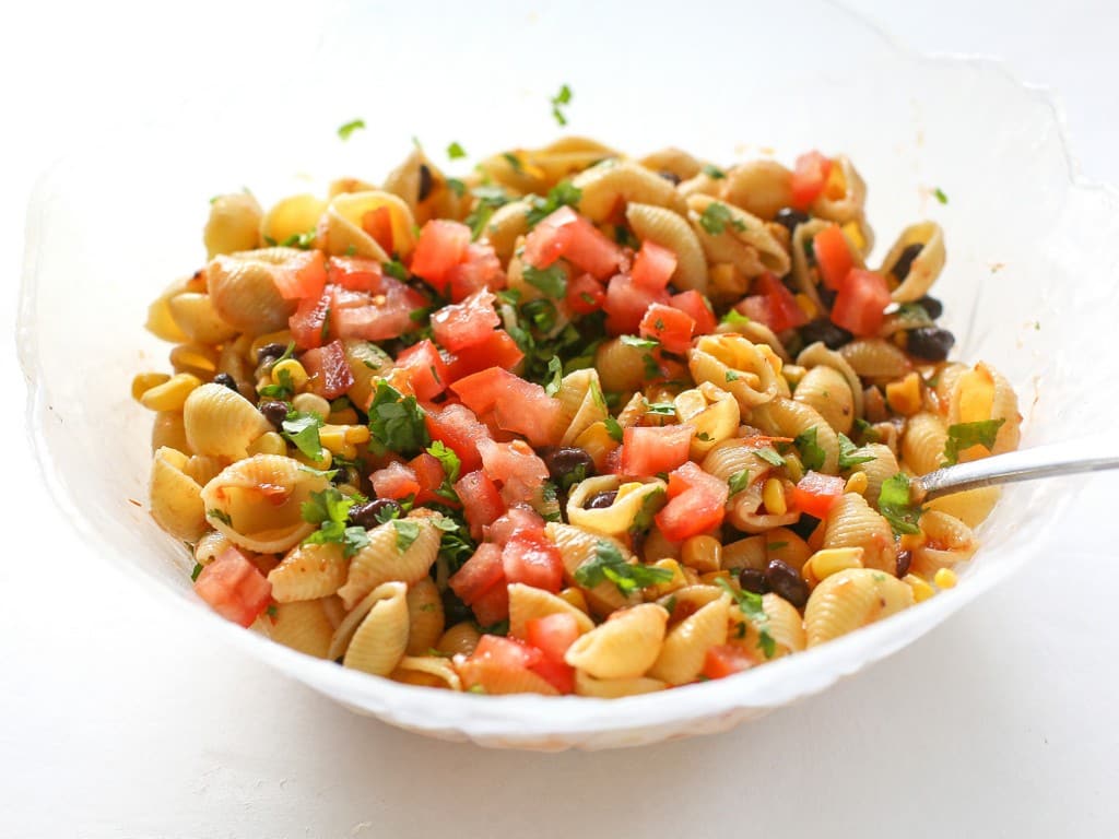 Taco Pasta Salad - black beans, corn, cilantro, and tomatoes. the-girl-who-ate-everything.com