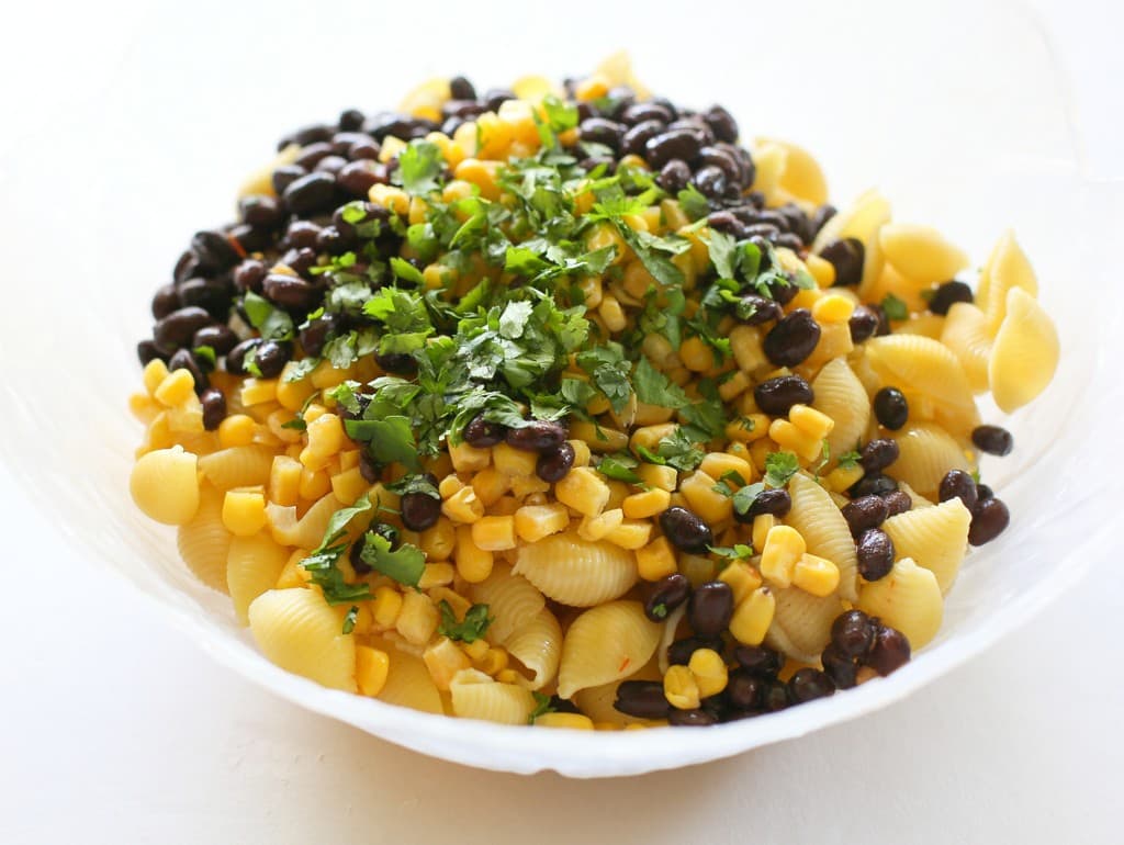 taco pasta salad ingredients in a bowl