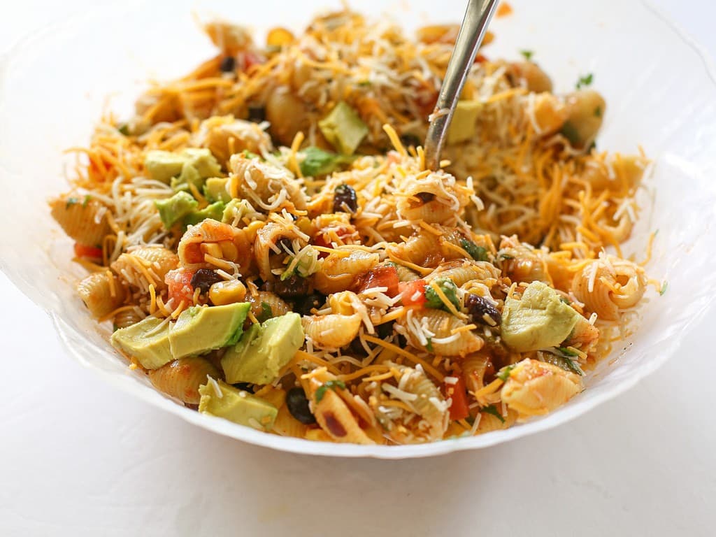 Taco Pasta Salad - black beans, corn, cilantro, and tomatoes. the-girl-who-ate-everything.com