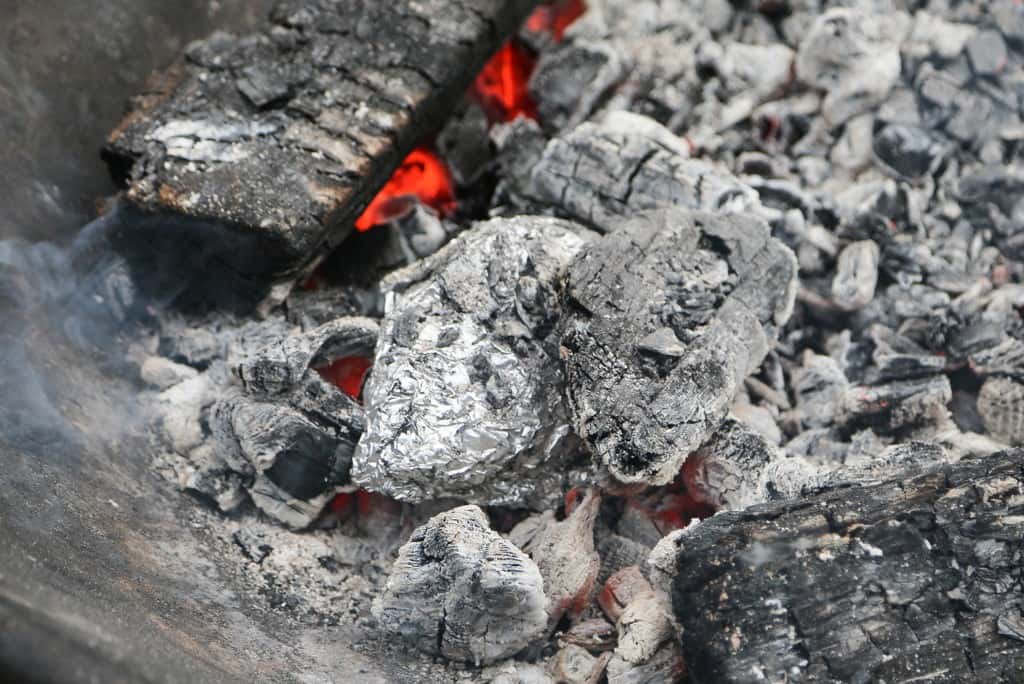 Easy Tin Foil Dinners - a camping tried and true recipe. Also called "hobo" dinners. So good! the-girl-who-ate-everything.com