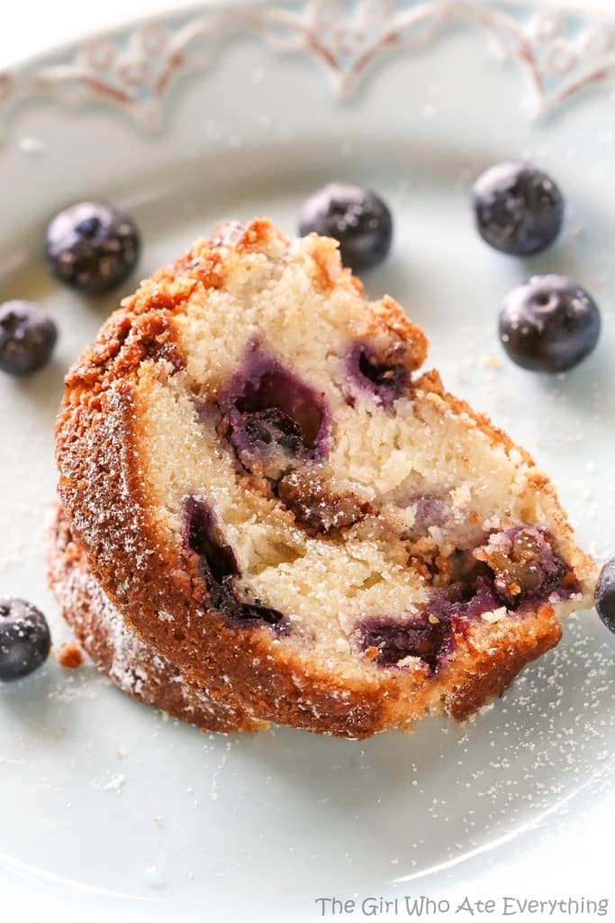Are you ready for the moistest, dense and rich Blueberry Sour Cream Coffee Cake with a cinnamon brown sugar filling? This is one decadent breakfast or brunch treat! the-girl-who-ate-everything.com