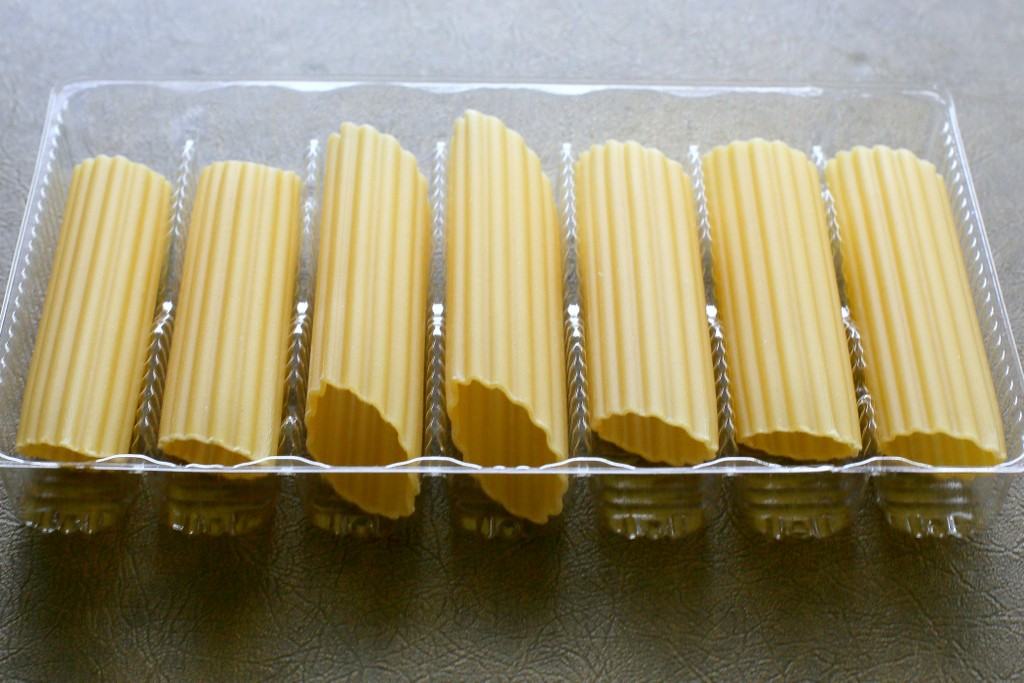 String Cheese Manicotti - Easy to stuff manicotti by using string cheese. Weeknight meals don't get easier than this. the-girl-who-ate-everything.com