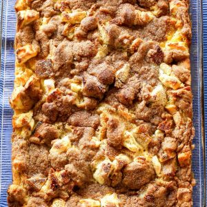 This Cinnamon Cream Cheese Casserole is warm and cozy. The perfect recipe for entertaining! It can be made ahead of time and popped in the oven. the-girl-who-ate-everything.com