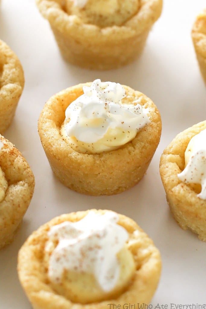 These Eggnog Cookie Cups are sugar cookie cups filled with a creamy eggnog filling. Super easy and festive for Christmas! the-girl-who-ate-everything.com