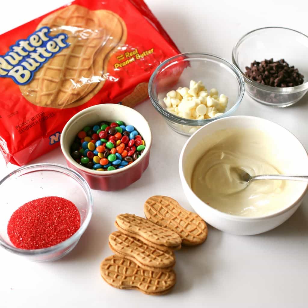 Santa Claus Cookies - easy Nutter Butter based cookies to make with your kids that are fancy enough to give to your friends. the-girl-who-ate-everything.com