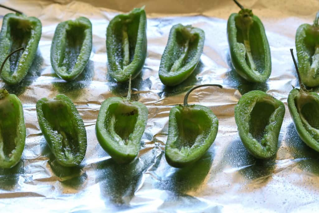 Buffalo Chicken Jalapeno Poppers - buffalo chicken dip meets jalapenos! Game food right here. the-girl-who-ate-everything.com