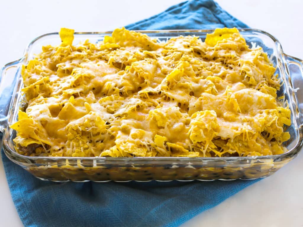Nacho Pot Pie - a taco flavored filling of black beans and corn topped with a crushed tortilla chip crust.